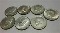 7 Kennedy half dollars 1964 - 3, 1966 - 2, and