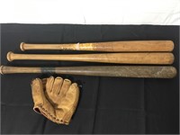Antique baseball bats and glove.