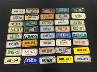 Vintage metal mini license plates.