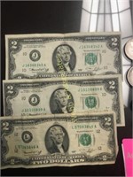 Three $ 2.00 bills, 2 Kennedy half dollars,