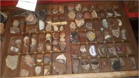 5th shelf: small geodes, agates, petrified wood,