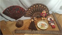 Dolls, fans, peacock feather ornament