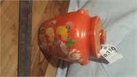 Orange pottery cookie jar