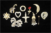 10 Brooches and 1 Stick Pin