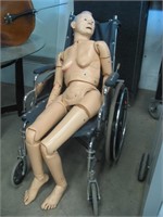 Wheel chair and doll