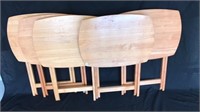 Five wooden folding trays