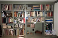 Contents of book shelves, books including art,
