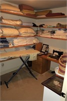 Contents of linen closet; including Singer sewing