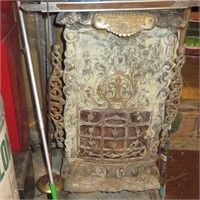 OLD PARLOR STOVE W ISING GLASS