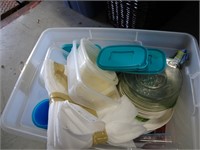assorted kitchen items in plastic tote