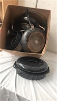 Box of pots and pans, with enamel pot with lid