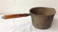 Vintage 3 quart cast iron sauce pan with wood