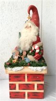 32" tall wooden Santa in chimney