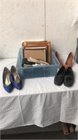 Tote full picture frames and ladies shoes