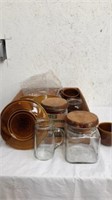 Group of stoneware dishes with mug glasses and