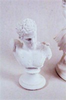 Three White Plaster Statues