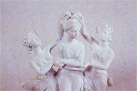 Three White Plaster Statues