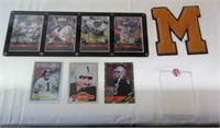 (4) U of M football player cards in hard case.