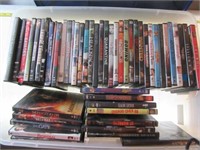 (50+) DVD's with Tote. Movies include 12 Rounds,