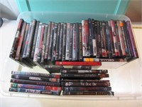 (50+) DVD's with Tote. Movies include The Tuxedo,