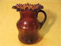 Amethyst pitcher with ruffled top