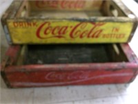 Two Coca-Cola wooden cases, one yellow & one red