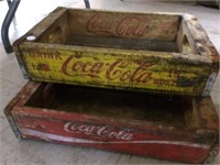 Two Coca-Cola wooden cases, one yellow & one red