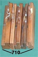 Five assorted wooden molding planes