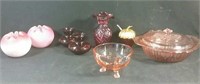 Lot of pink serving dishes and vases including