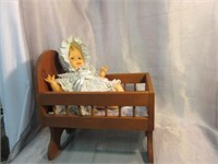 Horseman Baby Doll in Wooden Rocking Cradle