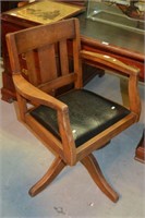 Vintage oak captain's chair on swivel base