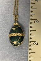 Fabulous Russian enameled egg with gold chain