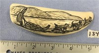 5" whales tooth scrimshawed by Peter Mayac with a