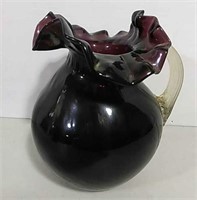 Purple glass vase or pitcher