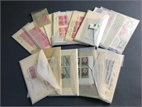 11 envelopes of stamps.