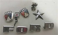 Assorted Ford automobile emblems