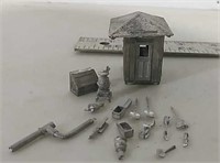 Miniature metal home with components