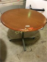 Medium oak 36" round table with chrome base