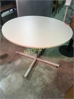 Teknion 42" round table on tubular base, beige