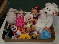 Box of various stuffed animals and hair bows