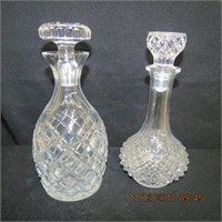 2 decanters 1 crystal and 1 glass