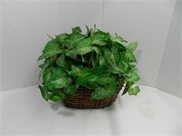Basket with artificial greenery