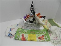 Basket with Collection of linens, scarfs, etc