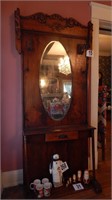 CARVED HALL TREE WITH OVAL BEVELED MIRROR 92"X38
