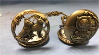 Train pocket watch and wolf pocket watch, both