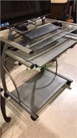 Metal frame computer desk with pull out tray and