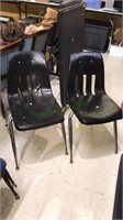 Pair of adult molded plastic chrome leg chairs