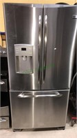 GE profile refrigerator freezer, with water in