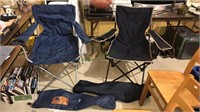 Two folding chairs with travel pouches and