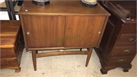 1960s walnut record cabinet with two sliding